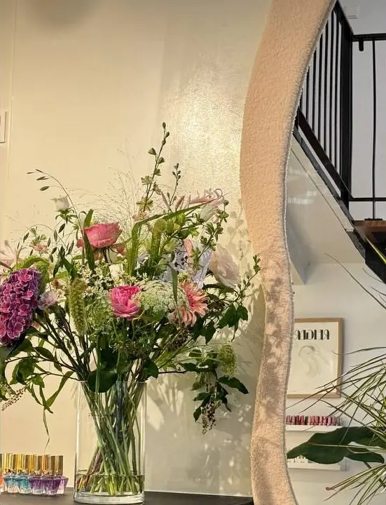 Flowers and mirror inside Lynn Studio